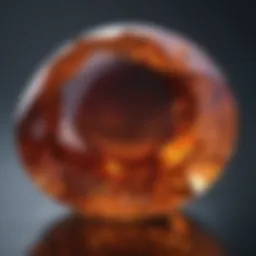 Close-up view of polished hessonite stone showcasing its unique color and texture